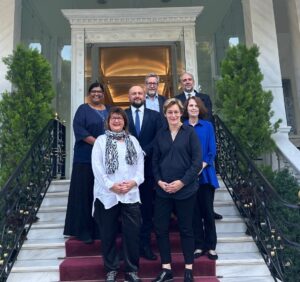 Photograph of Global Ageing Network Board Members in front of the Theoxenia Palace